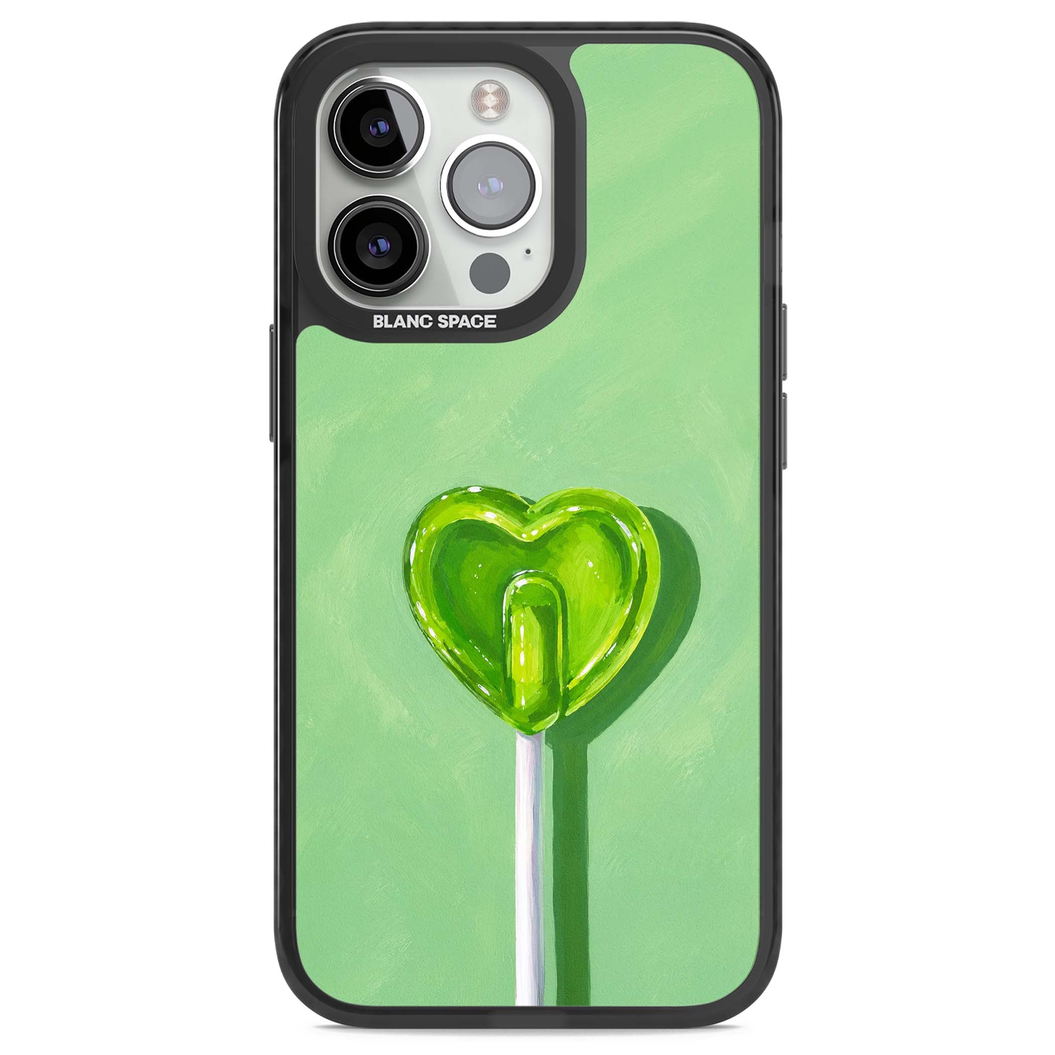 Green Lollipop candy art iPhone case featuring a glossy green heart-shaped lollipop on a painted pastel green background | Black Impact Magsafe case for iPhone 13 Pro, iPhone 14 Pro, iPhone 15 Pro