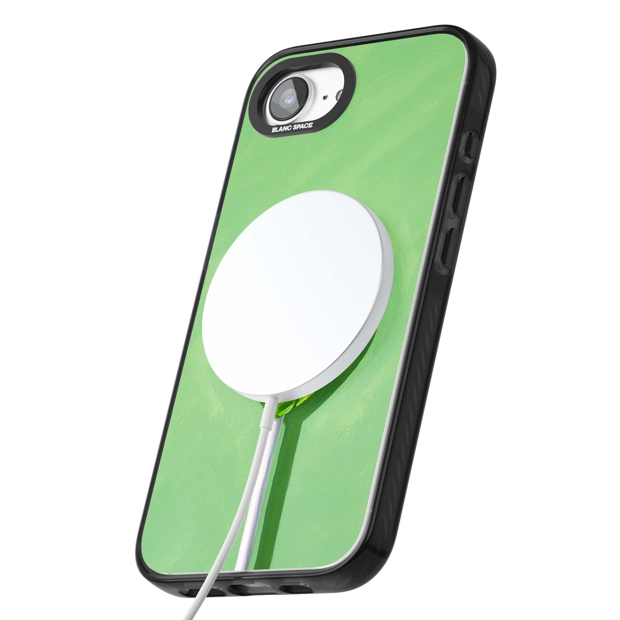 Green Lollipop candy art iPhone case featuring a glossy green heart-shaped lollipop on a painted pastel green background | Black Impact Magsafe case for iPhone 16e, iPhone 17e