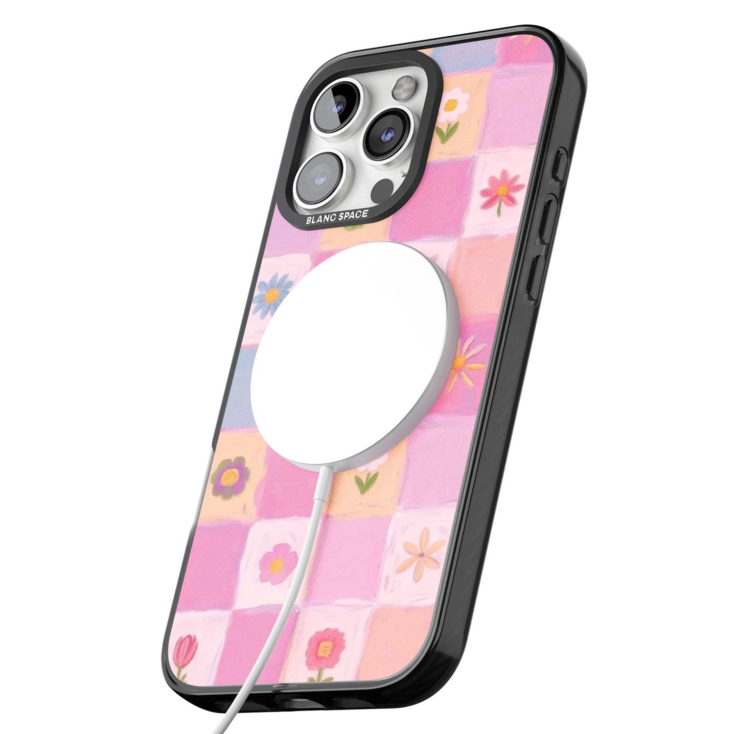 Pastel Flower Patchwork cottagecore iPhone case featuring painted pink and lilac squares with daisies and wildflowers | Black Impact Magsafe case for iPhone 16 Pro, iPhone 16 Pro Max