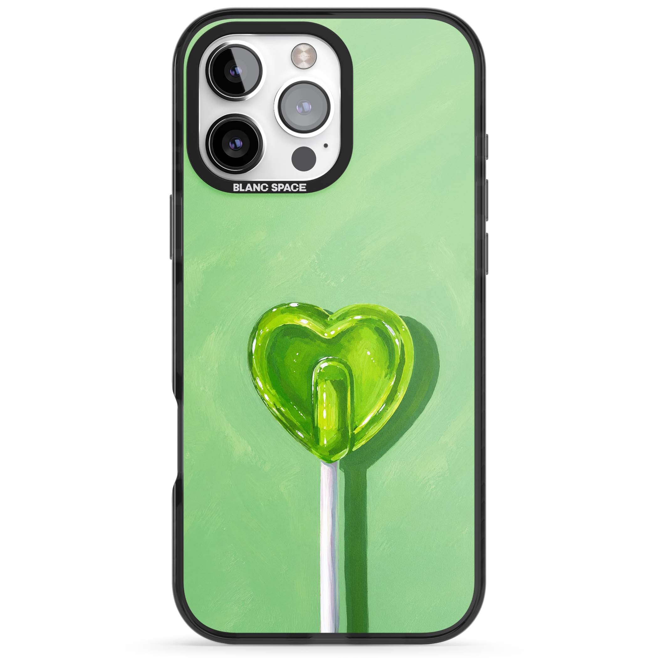 Green Lollipop candy art iPhone case featuring a glossy green heart-shaped lollipop on a painted pastel green background | Black Impact Magsafe case for iPhone 16 Pro, iPhone 16 Pro Max