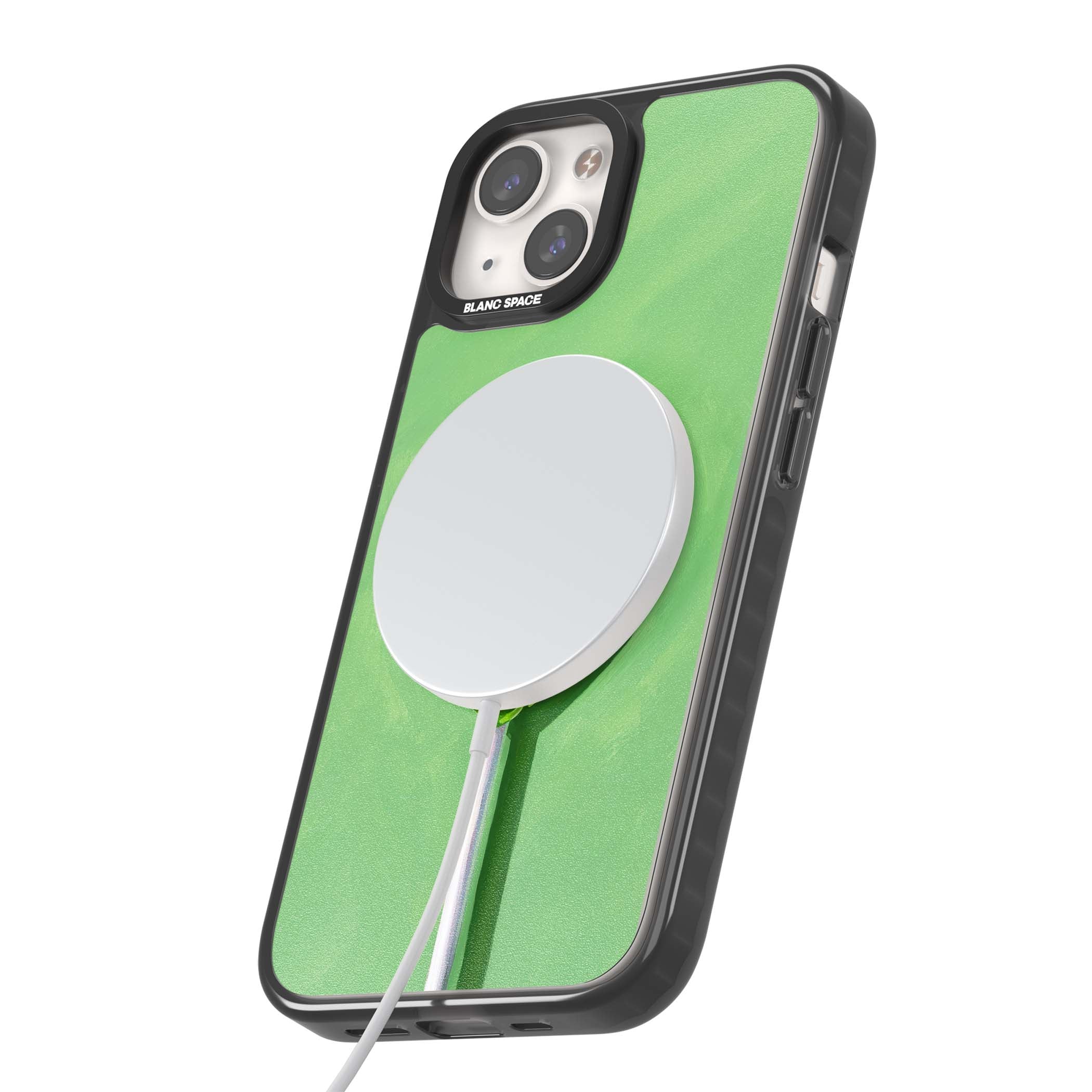 Green Lollipop candy art iPhone case featuring a glossy green heart-shaped lollipop on a painted pastel green background | Black Impact Magsafe case for iPhone 13, iPhone 14, iPhone 15