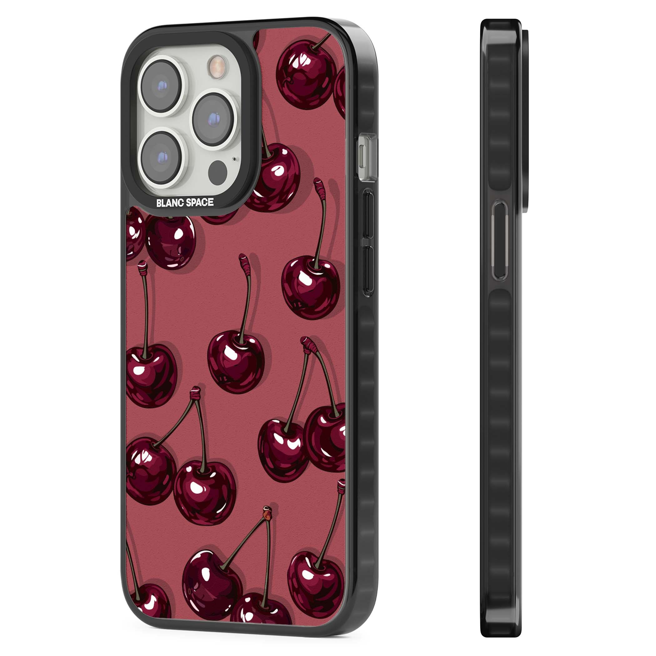 Cherry Rebel coquette iPhone case featuring glossy burgundy cherries on a dusty rose background | Black Impact case for iPhone 13 Pro, iPhone 14 Pro, iPhone 15 Pro