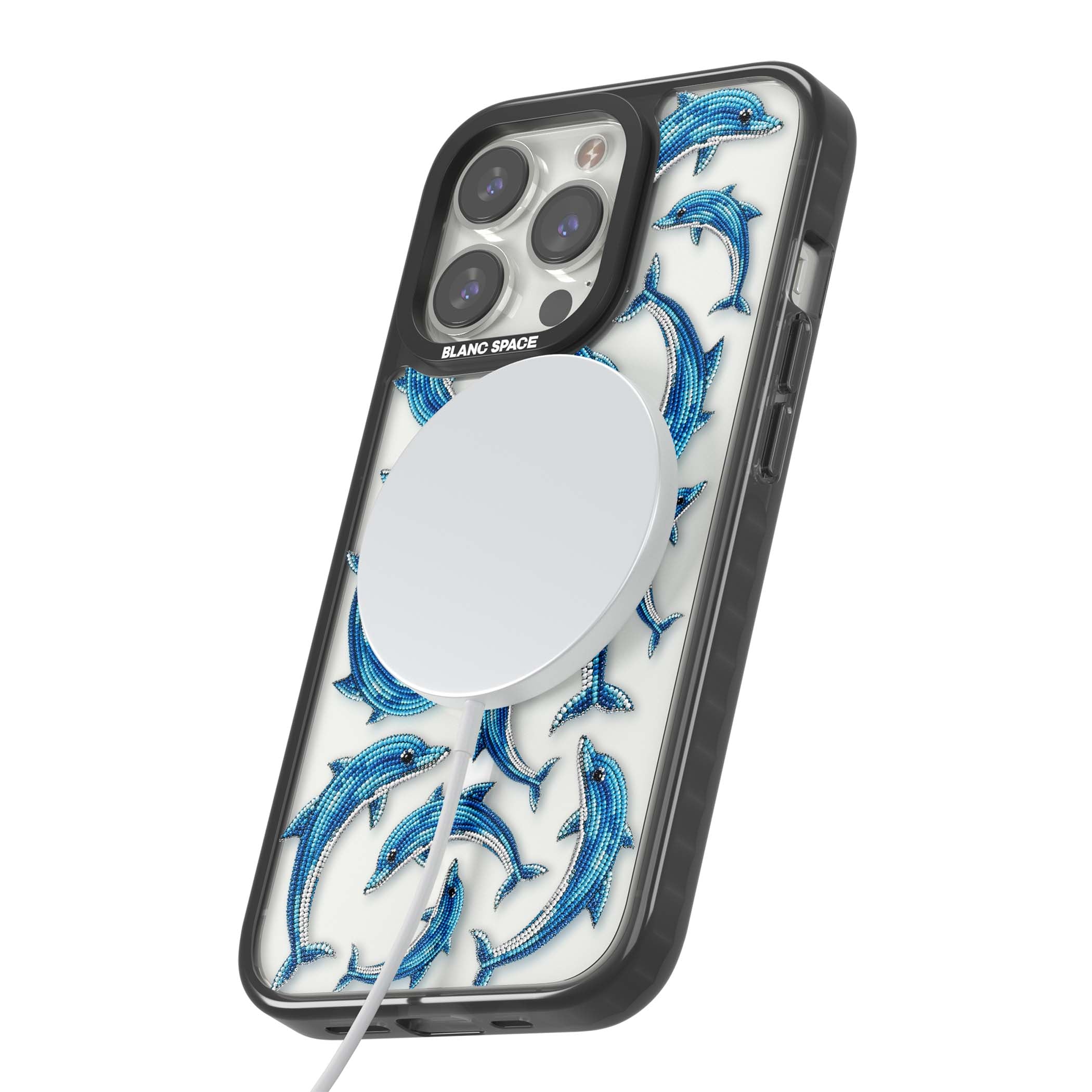 Beaded Dolphins coastal iPhone case featuring beaded dolphins in blue and white swimming across a clear background | Black Impact Magsafe case for iPhone 13 Pro, iPhone 14 Pro, iPhone 15 Pro