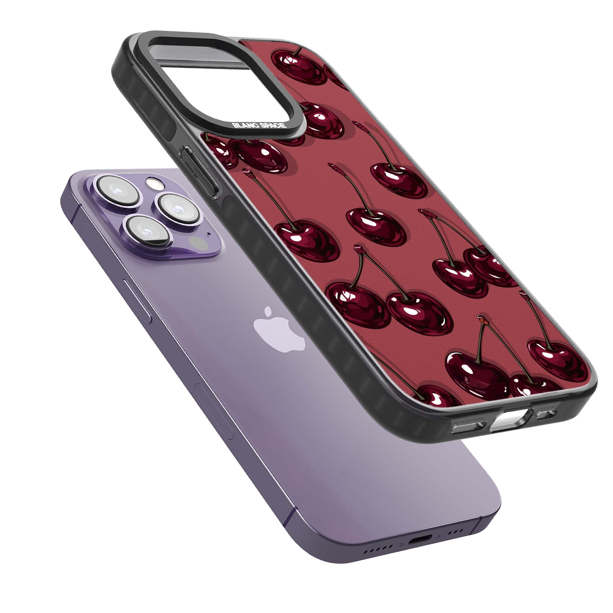 Cherry Rebel coquette iPhone case featuring glossy burgundy cherries on a dusty rose background | Black Impact Magsafe case for iPhone 13 Pro, iPhone 14 Pro, iPhone 15 Pro
