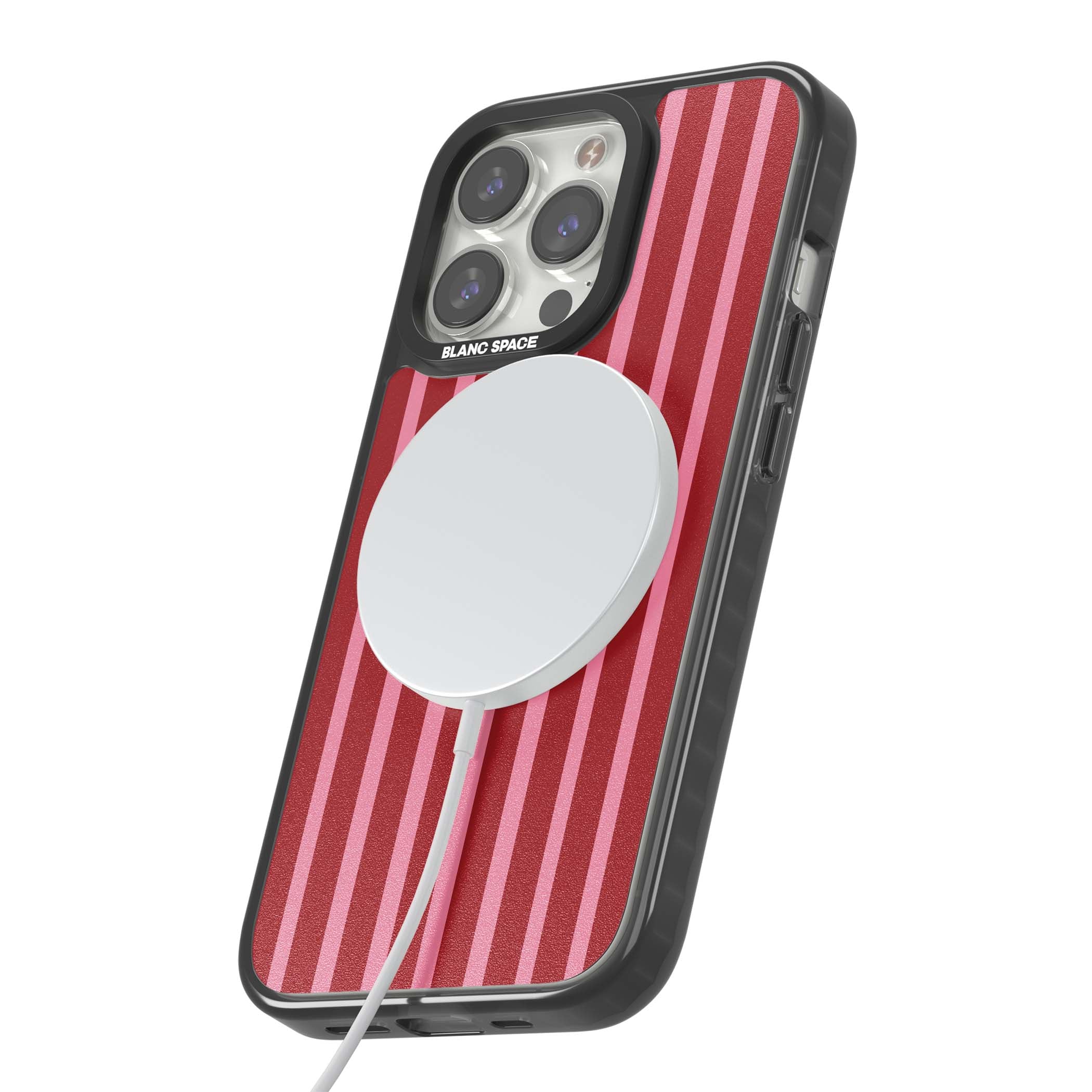 Raspberry Stripe coquette iPhone case featuring red and pink vertical stripes in a candy-inspired pattern | Black Impact Magsafe case for iPhone 13 Pro, iPhone 14 Pro, iPhone 15 Pro