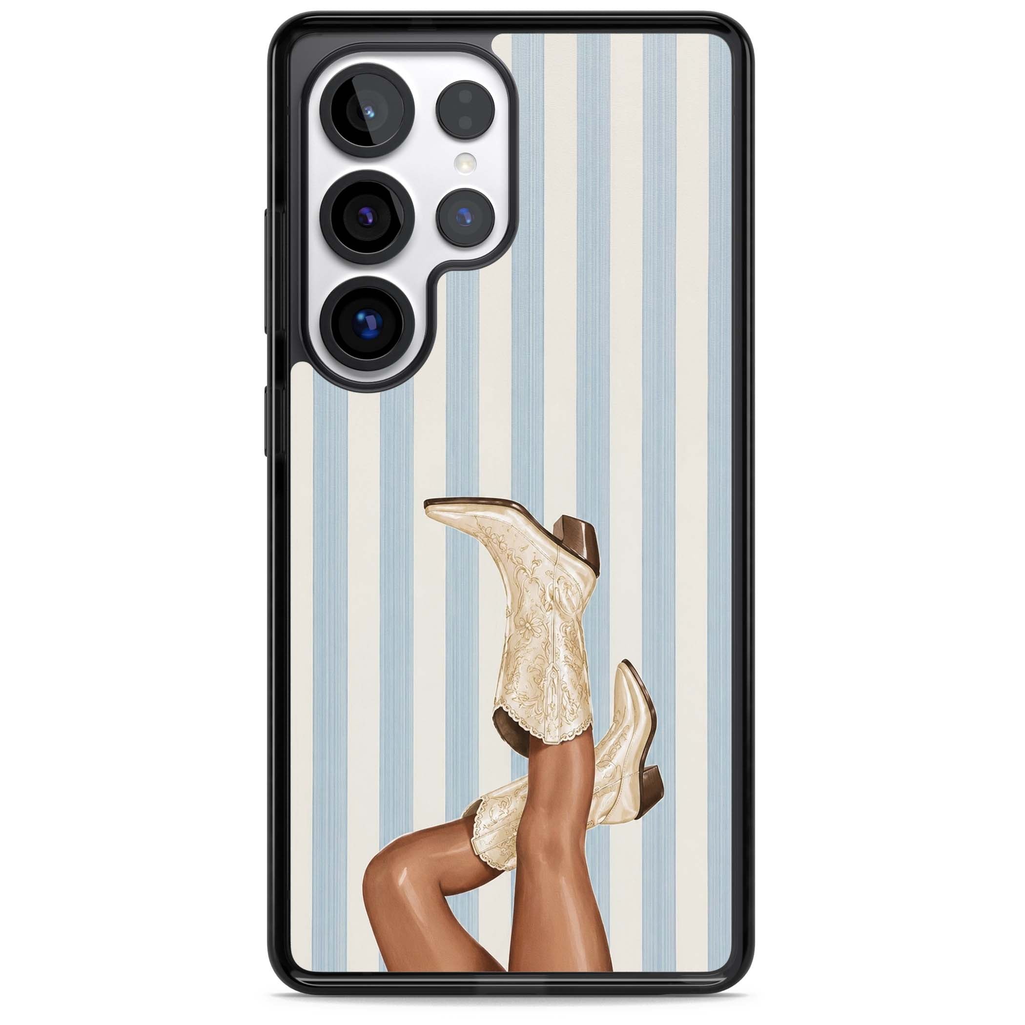Cowgirl Boots coastal cowgirl iPhone case featuring embroidered western boots, tanned legs and a blue stripe backdrop | Black Impact case for Samsung Galaxy S25 Ultra